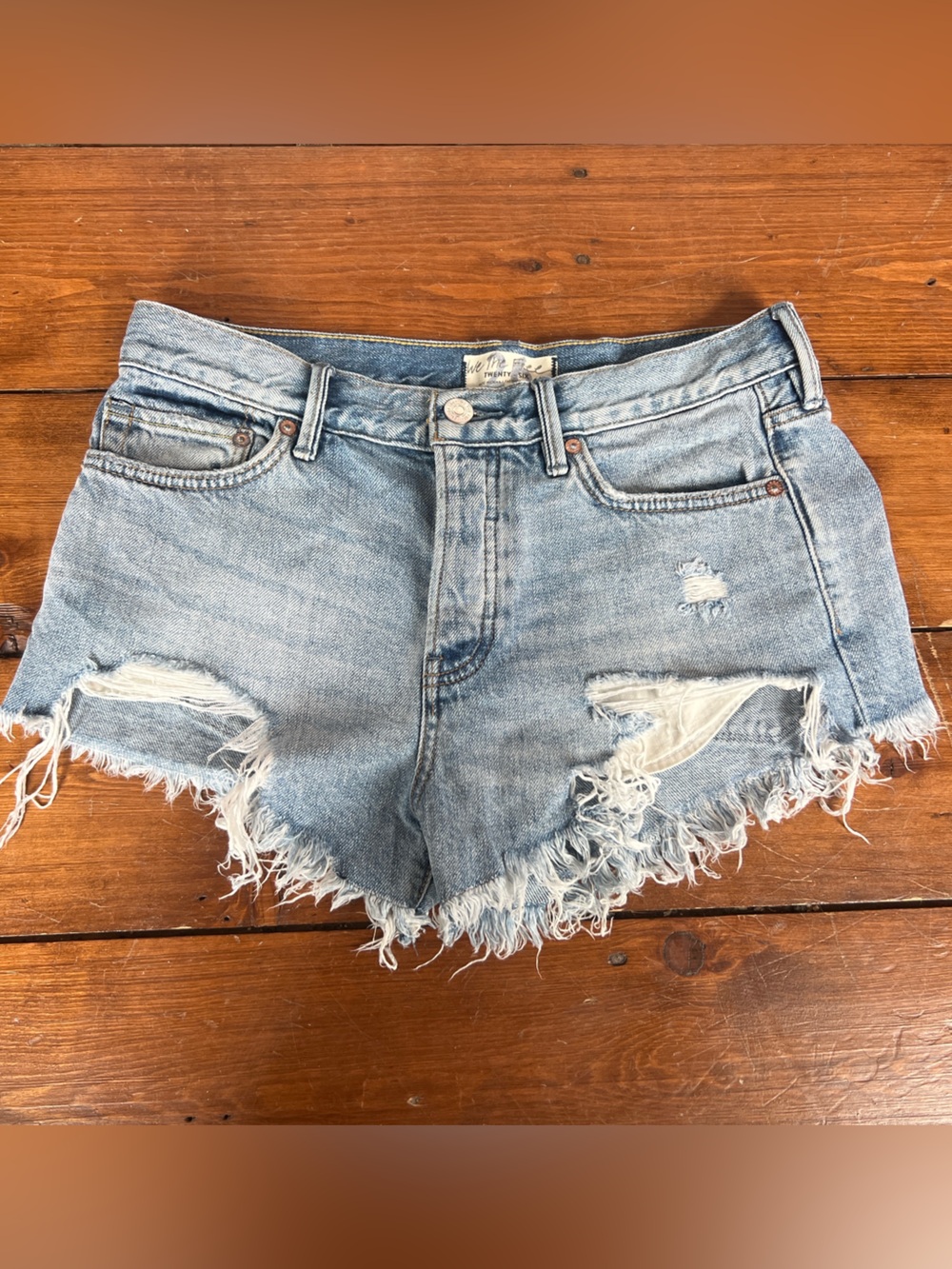 Free People Light Wash Distressed Denim Shorts